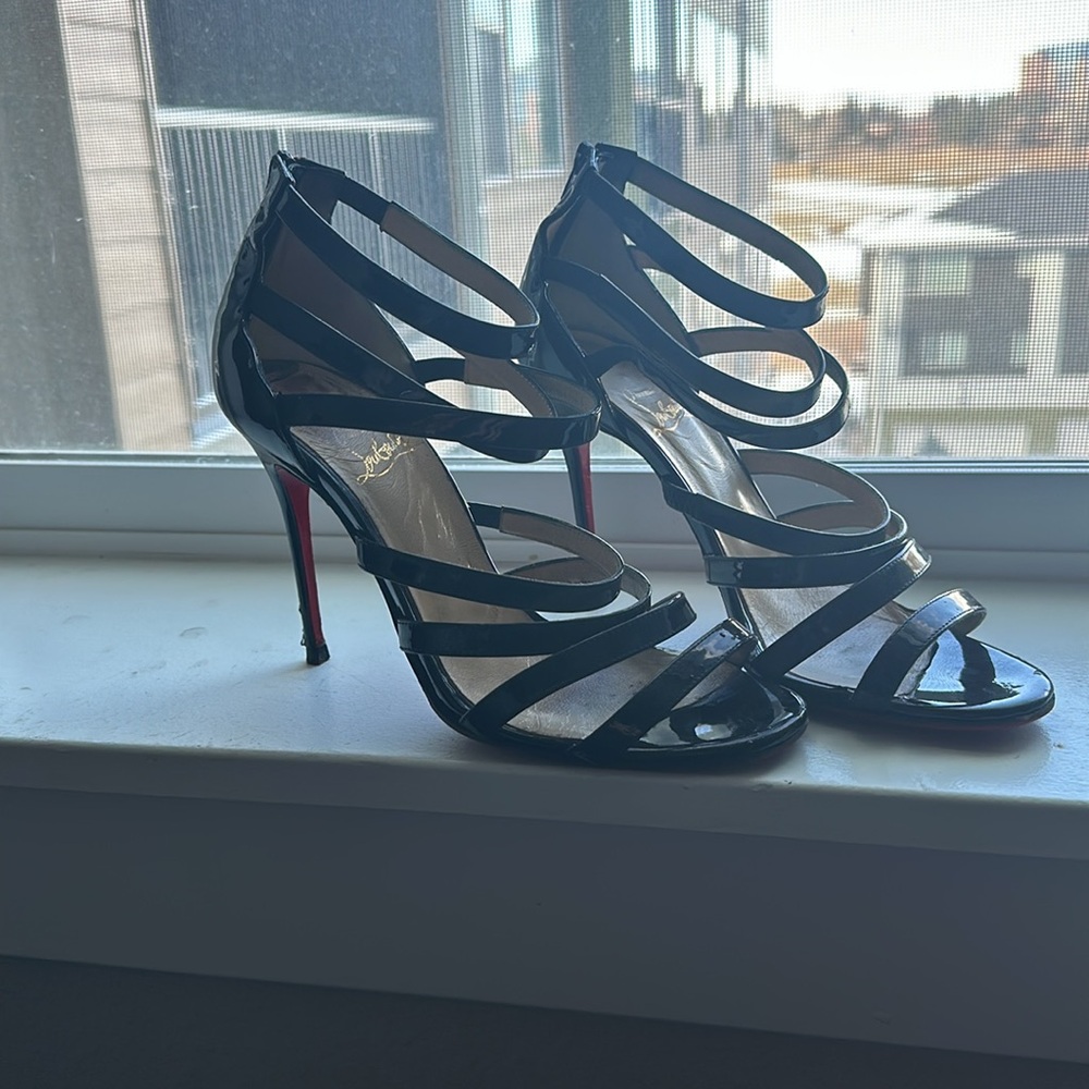 Christian Louis Vuitton size 6 1/2 stray black patent leather stilettos